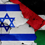 flags of Israel and Palestine painted on cracked wall