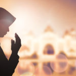 Muslim Woman pray and Beautiful background.