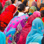 Muslim women wearing colorful headscarves