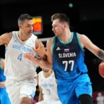 Luka Dončič in Luis Scola.