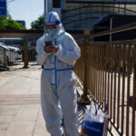 Beijing requires negative Covid-19 results before entering public areas during holiday