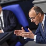 German Chancellor Olaf Scholz delivers a statement at German parliament