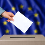 Election,In,European,Union.,The,Hand,Of,Woman,Putting,Her