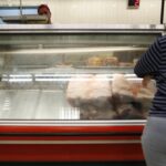 Venezuelans looking for food as government and businesses dispute